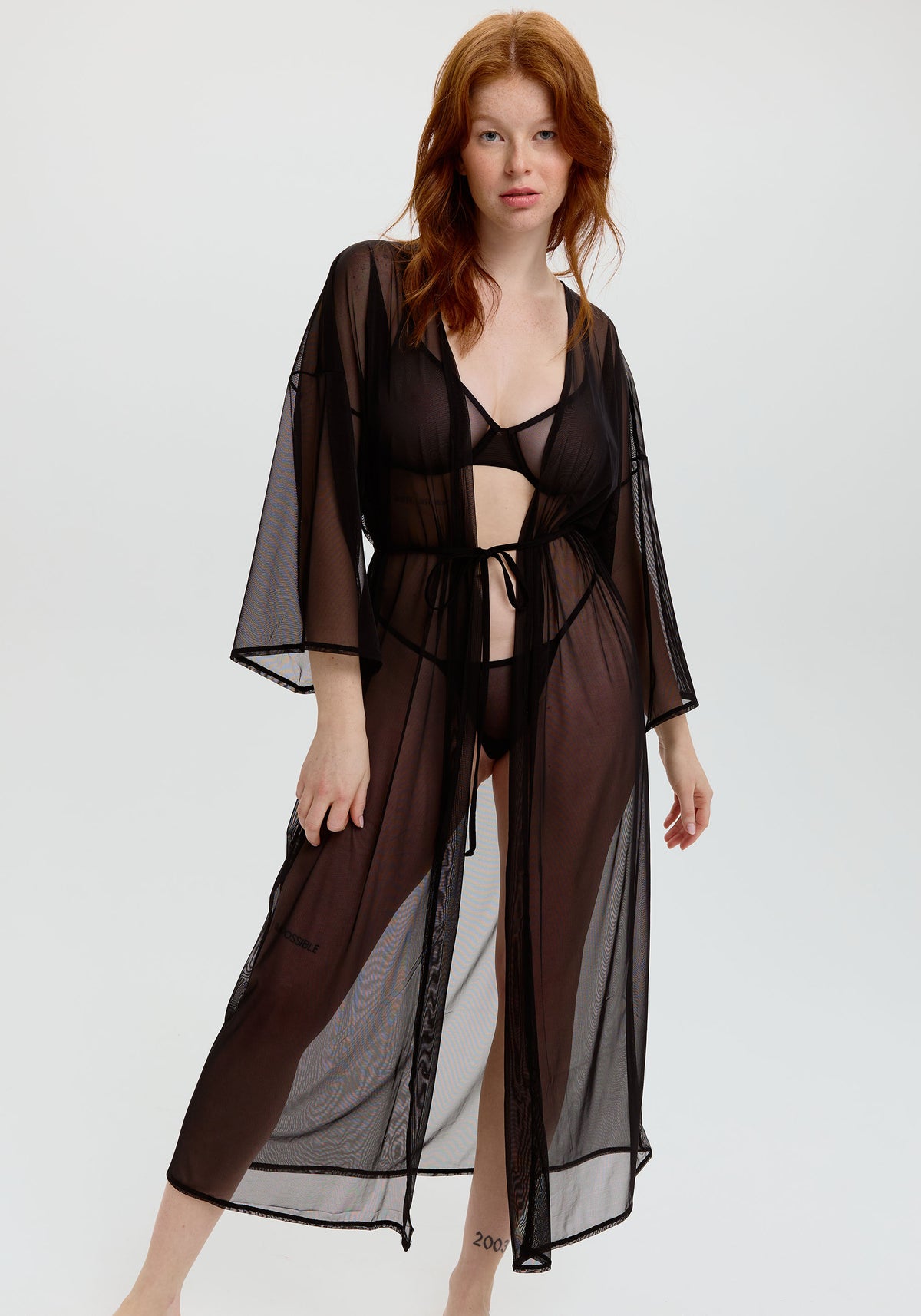 model is wearking a size 1 kimono-black gaia kimono