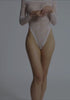 model is wearing an XS bodysuit - white cascade bodysuit
