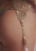 model is wearing a 32DD bra - gold celeste unlined bra