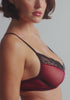 model is wearing a 32DD bra - black,multi,red spell unlined bra