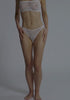 model is wearing an XS panty - white cascade high leg thong