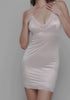 model is wearing an S slip-pink luster slip