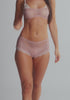 model is wearing an S panty - pink bijou tap short