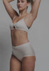 model is wearing an S bralette-nude phantom bralette