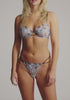 model is wearing a 32D bra - blue,multi ondine unlined bra