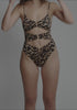model is wearing an S one-piece swimsuit - multi solstice v-scoop one-piece swimsuit