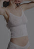 model is wearing an XS cami - multi,white the micro lace trim cami