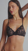 model is wearing a 32C bra - black the lace unlined bra