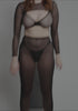 model is wearing an S shrug-black gaia shrug