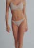 model is wearing an S bralette - nude the cotton bralette