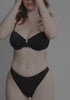 model is wearing an S+ bikini top - black malta underwire bikini top
