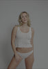 model is wearing an S tank - multi,white dream cotton pointelle tank