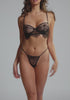 model is wearing a 32C bra - black serene unlined balconette bra