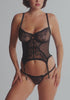 model is wearing an S+ corset - black enchant corset