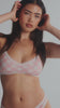 model is wearing an S panty - multi,pink the micro lace trim thong