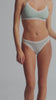model is wearing an XS panty - green,multi the micro lace trim thong