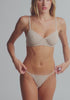 model is wearing a 32C bra - nude the cotton unlined molded bra