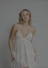 model is wearing an S dress - white wander embroidered eyelet halter dress