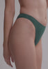 model is wearing an S bikini bottom - green capri high leg bikini bottom