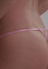 model is wearing an S panty - multi,pink ribonne string