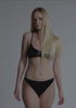 model is wearing an S bralette - black the rib bralette