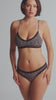 model is wearing an S panty - black,multi the micro lace trim thong