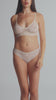 model is wearing an S panty - white the lace cheeky