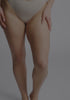 model is wearing an S+ bralette - nude the cotton bralette