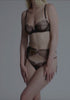 model is wearing a 34B bra - black lulu unlined balconette bra