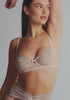 model is wearing an S/M garter belt - multi,pink magnolia garter belt