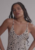 model is wearing an XS one-piece swimsuit - multi dawn scoop one-piece swimsuit