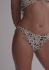 model is wearing an XS bikini bottom - multi capri high leg bikini bottom