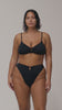 model is wearing an L bikini bottom-black solstice high leg bikini bottom