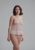 model is wearing an S babydoll - pink froufrou babydoll